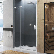 SanSwiss Cadura Drzwi prysznicowe jednoczęściowe wahadłowe lewe z elementem stałym 120 cm Aquaperle szkło przezroczyste/srebrny połysk - 787009_O1
