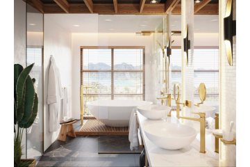Złota łazienka z luksusowym wyposażeniem: biała wanna wolnostojąca na tle panoramicznego okna, dwie umywalki nablatowe z bateriami Hansgrohe Metropol w złotym wykończeniu.