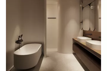 Minimalistyczna łazienka z wanną, dwoma umywalkami i designerskimi lustrami