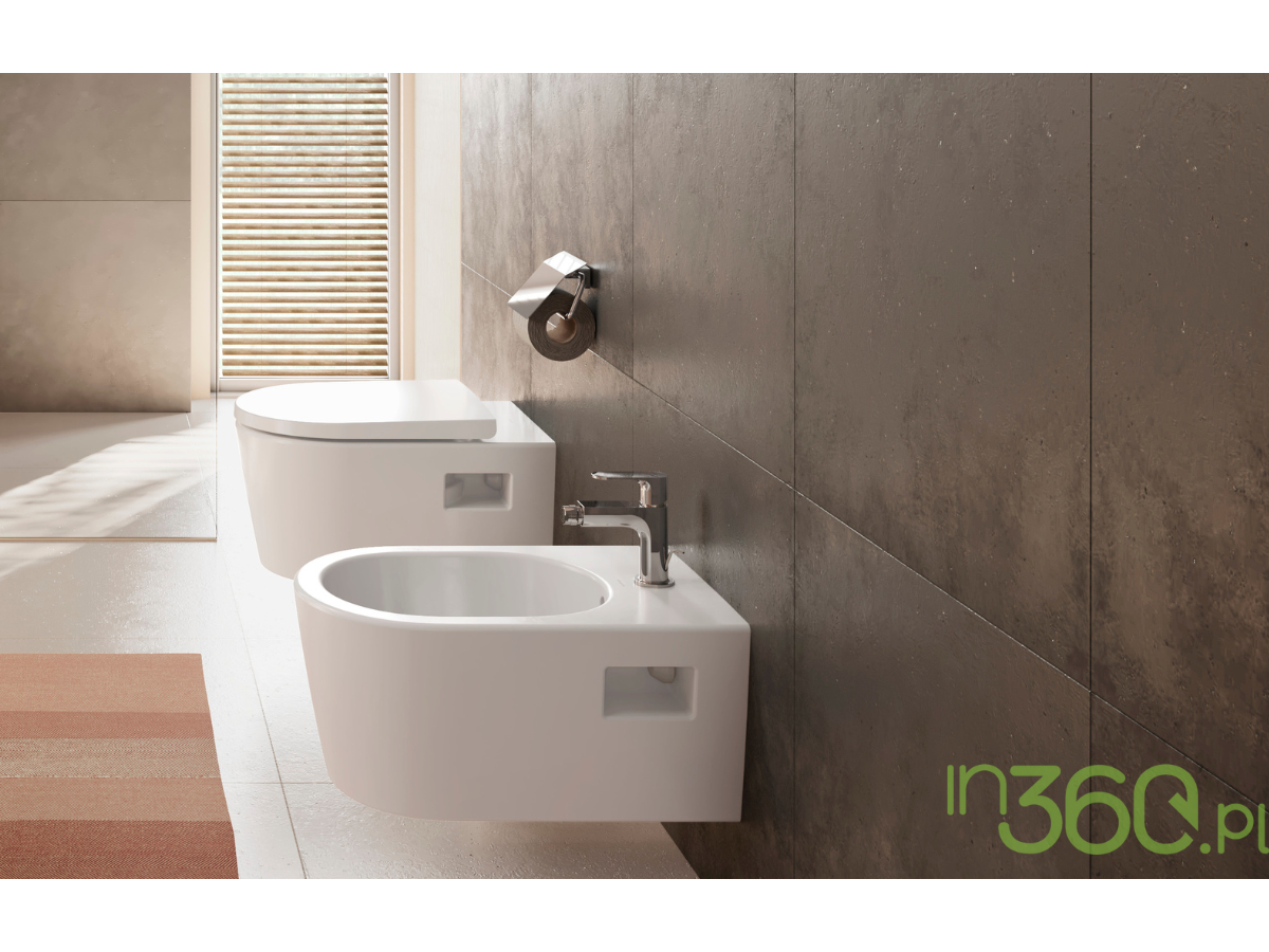Podwieszany bidet i WC na tle ciemnej płytki w eleganckiej łazience