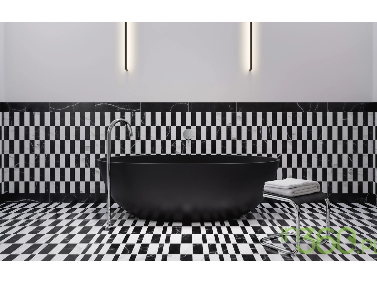 Czarna wanna w designerskiej łazience z geometrycznymi płytkami