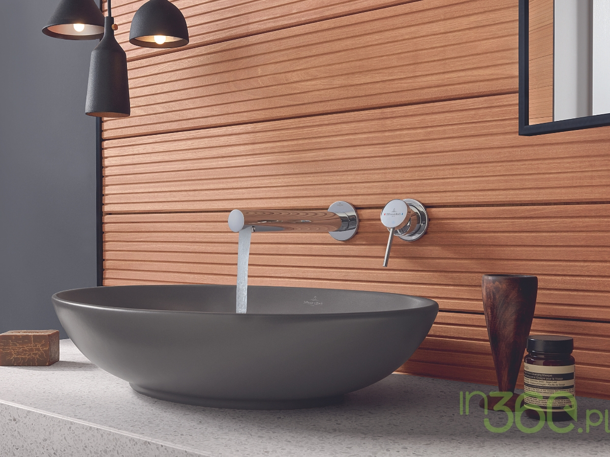 Nowoczesna łazienka z szarą umywalką marki Villeroy & Boch, minimalistycznym designem i stylowymi wykończeniami, idealna do luksusowych aranżacji wnętrz.