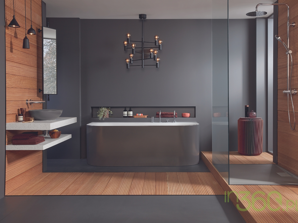 Elegancka łazienka z szarą wanną marki Villeroy & Boch, minimalistycznymi wykończeniami i nowoczesnym stylem, idealna do stylowych wnętrz.