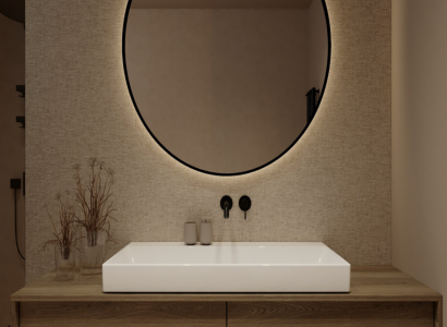Bateria podtynkowa Hansgrohe przy prostokątnej umywalce w eleganckiej łazience z okrągłym lustrem