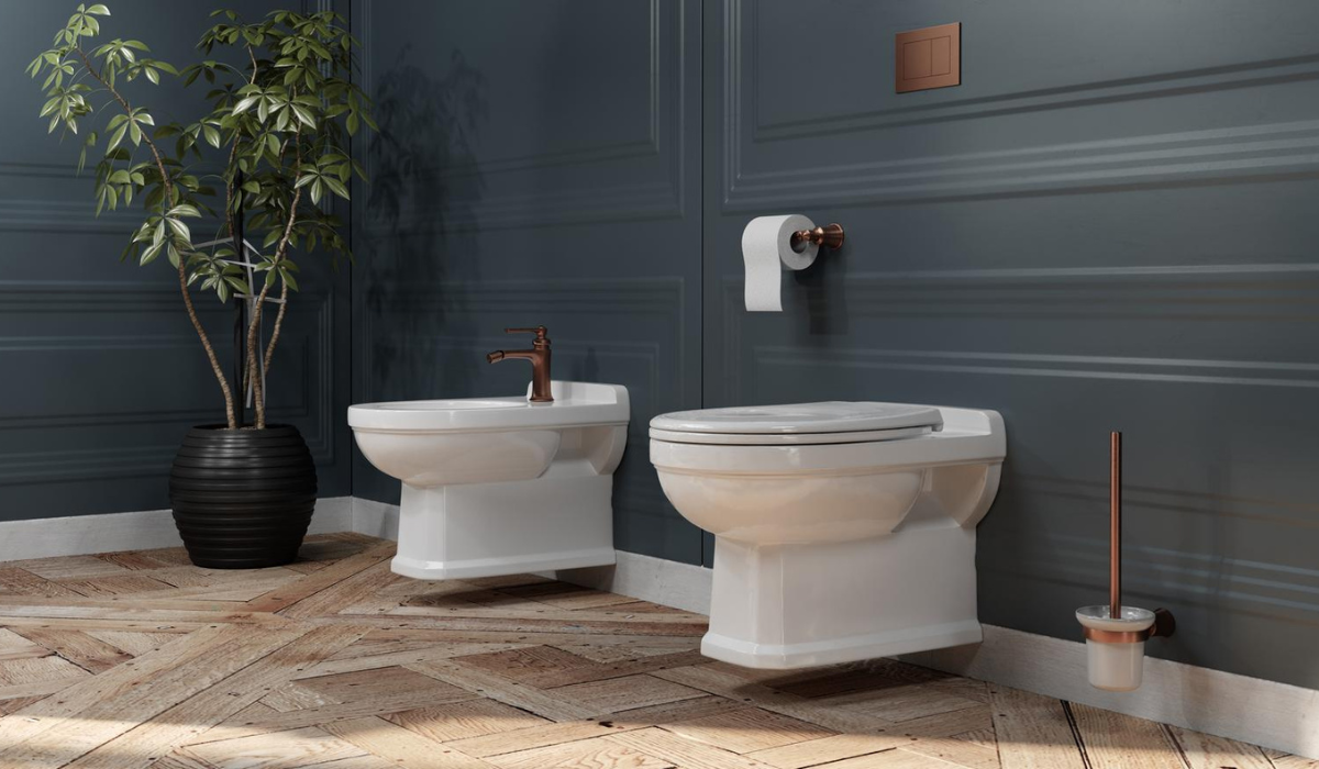  Miedziane akcesoria łazienkowe Omnires Art Line w eleganckim wnętrzu z bidetem i WC
